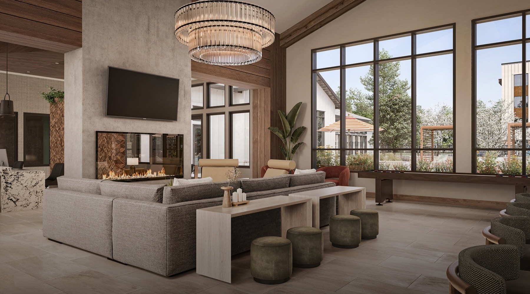 lounge with high ceilings and modern decor