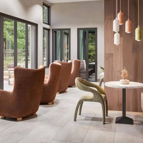 a room with chairs and a table