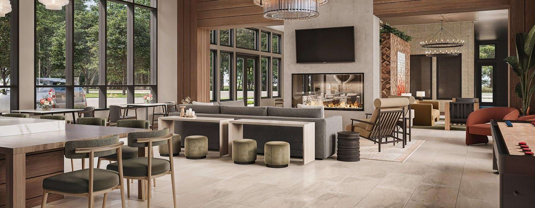 a room with a table chairs and a fireplace